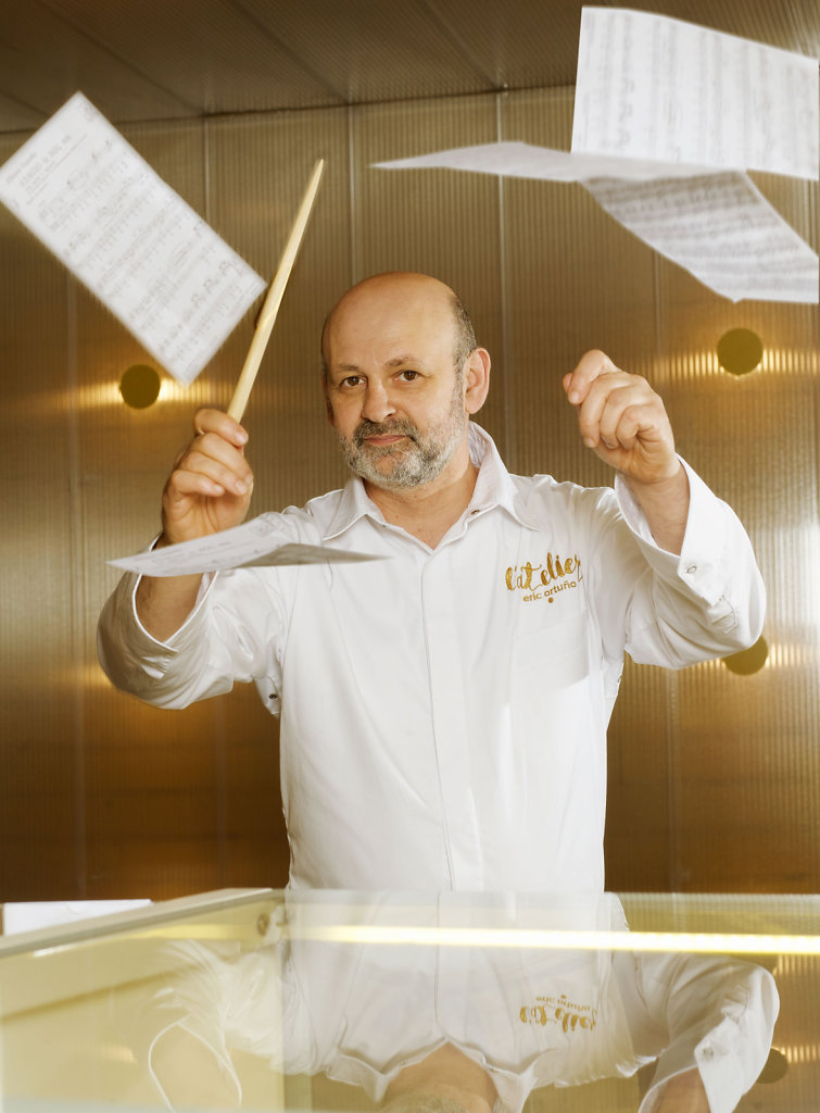 Eric Ortuño directing the orchestra